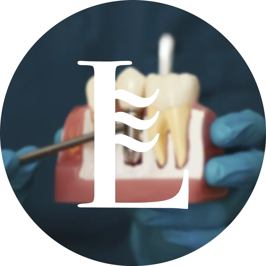 Icono Loscos con Implantes dentales desenfocado